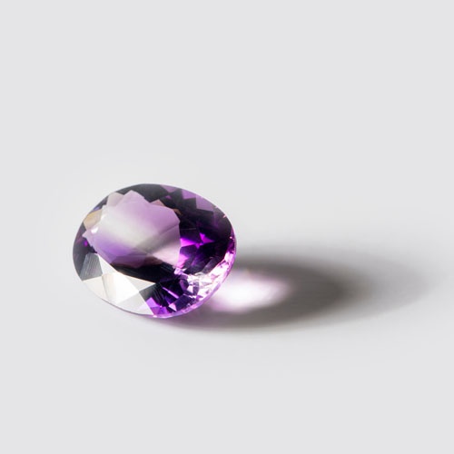 Large,Polished,Amethyst,Gemstone,Close-up,On,White,Background